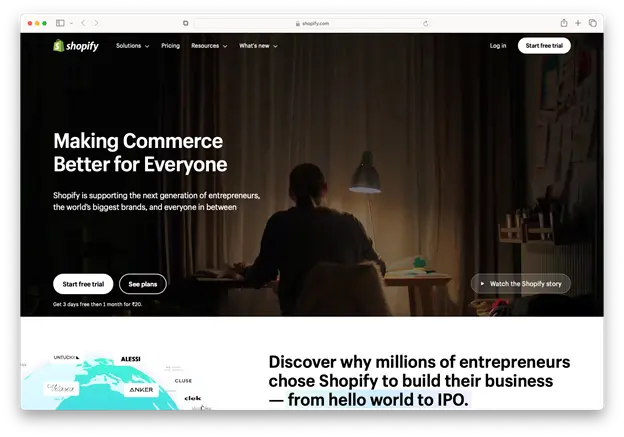 Screenshot of Shopify's website featuring a dark-themed landing page. The headline reads 'Making Commerce Better for Everyone' with supporting text about Shopify's role in supporting entrepreneurs and brands. 